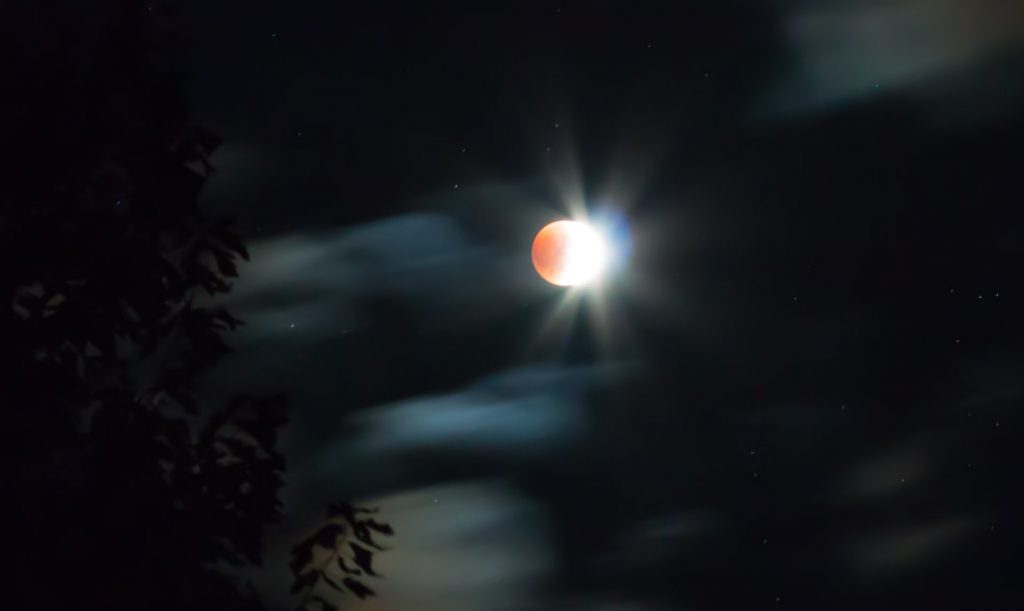 Lunar Eclipse on a Cloudy Night